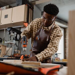 A man doing some woodwork